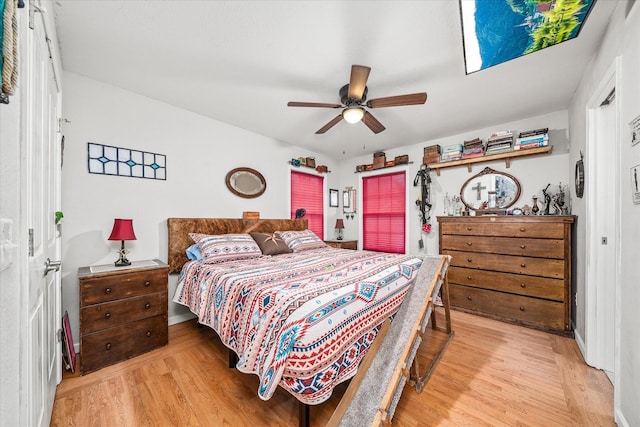 bedroom featuring ceiling fan and light hardwood / wood-style floors