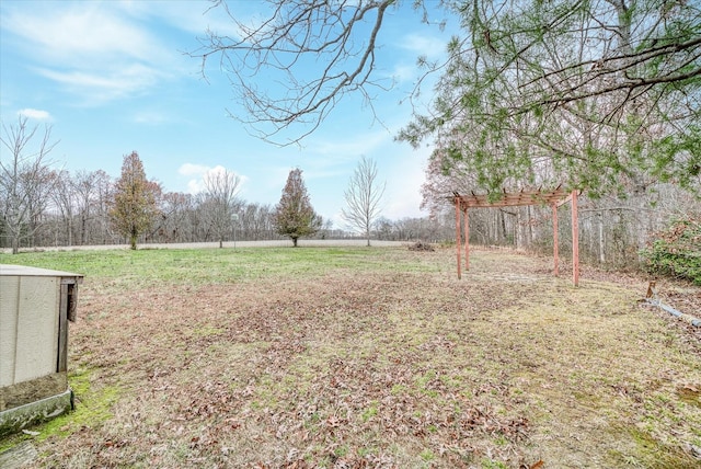 view of yard with a rural view