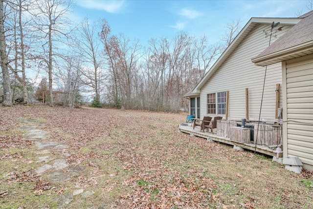 view of yard featuring a deck