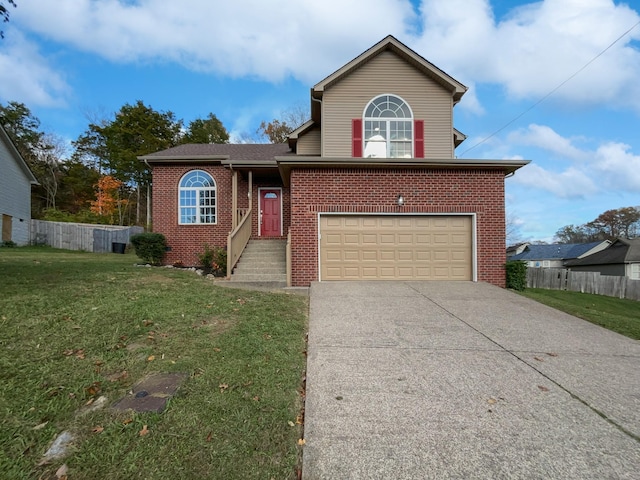 view of front property featuring a front lawn and a garage