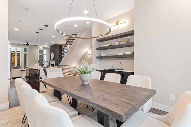 dining area featuring ceiling fan