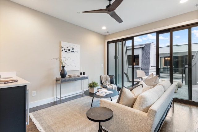 interior space with ceiling fan and dark hardwood / wood-style flooring