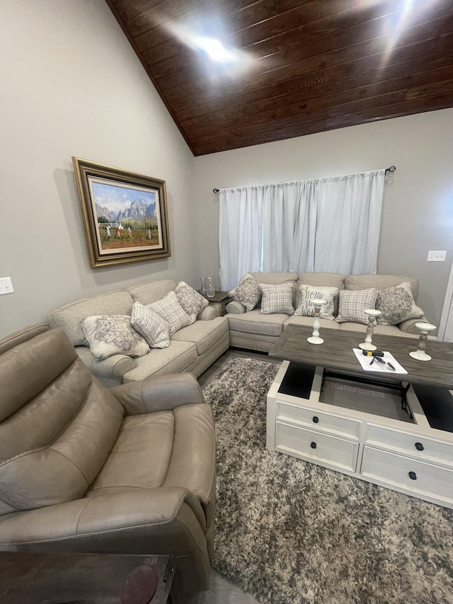 living room featuring wood ceiling and vaulted ceiling