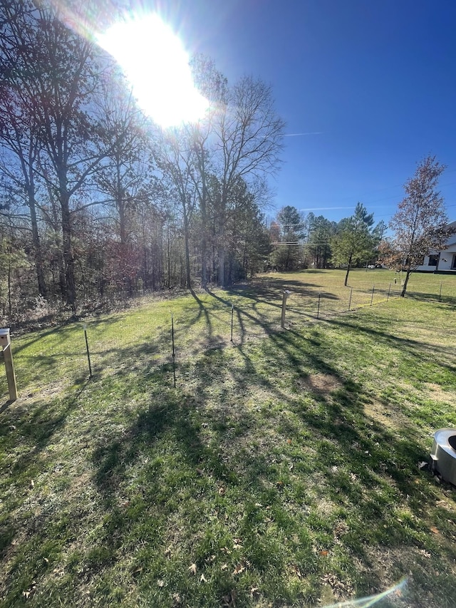 view of yard with a rural view