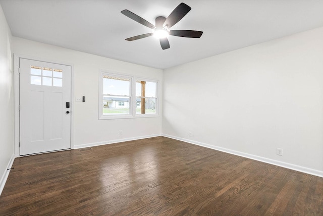 foyer featuring ceiling fan and dark hardwood / wood-style floors