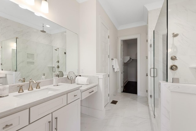 bathroom featuring crown molding, a shower with door, and vanity