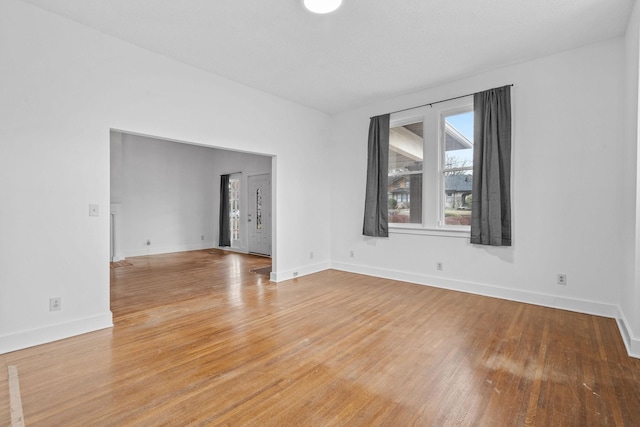 spare room featuring hardwood / wood-style flooring