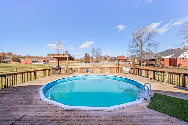 view of pool with a deck