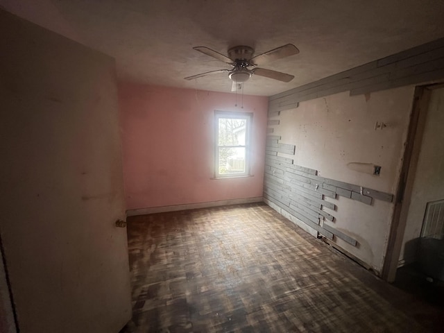 spare room featuring ceiling fan