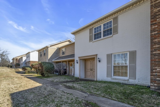 view of front of home with brick siding