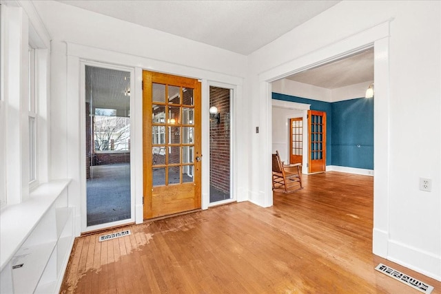 empty room featuring hardwood / wood-style flooring