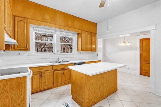 kitchen with sink, light tile patterned floors, decorative light fixtures, a kitchen island, and range