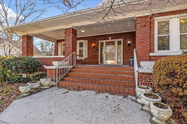 doorway to property with covered porch