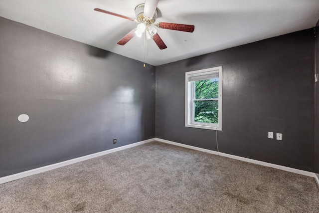 empty room with carpet and ceiling fan