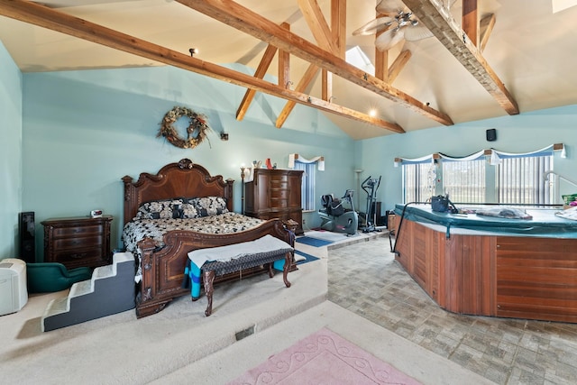 bedroom featuring beam ceiling and high vaulted ceiling