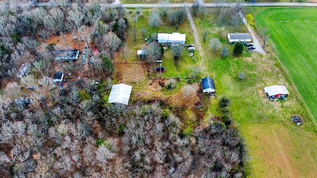 birds eye view of property featuring a rural view