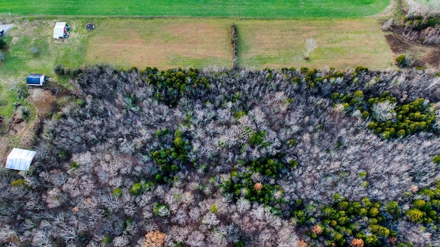 birds eye view of property featuring a rural view