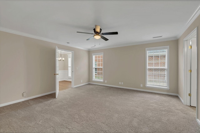 unfurnished bedroom with ceiling fan with notable chandelier, light colored carpet, and ornamental molding