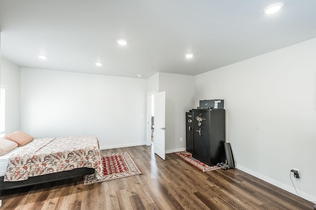 bedroom featuring dark wood-type flooring