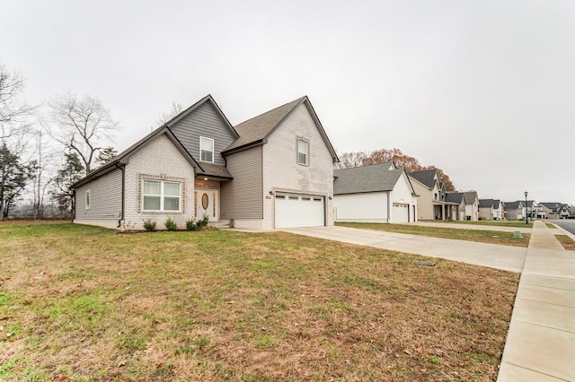 traditional home featuring a garage, brick siding, concrete driveway, a residential view, and a front yard