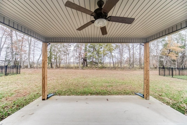 view of patio / terrace with a ceiling fan and fence