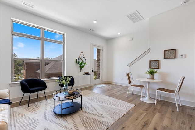 sitting room with light hardwood / wood-style floors