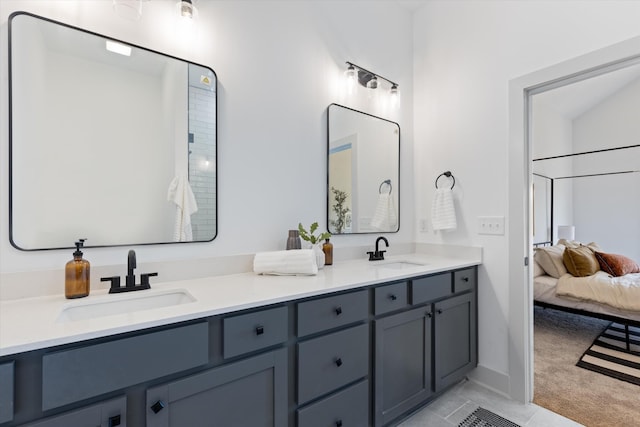 bathroom with vanity and tile patterned floors