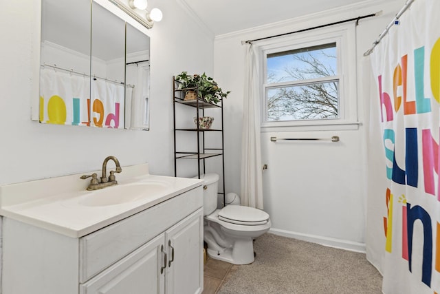 bathroom with tile patterned floors, ornamental molding, a shower with curtain, vanity, and toilet