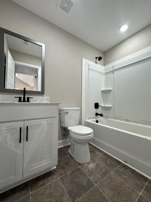 bathroom featuring visible vents, toilet, vanity, shower / tub combination, and baseboards