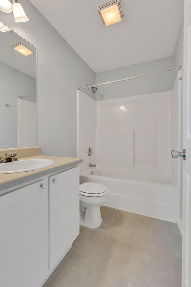 full bathroom with tile patterned floors, vanity, toilet, and shower / bath combination