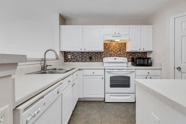 kitchen featuring white cabinetry, sink, tile patterned flooring, backsplash, and white appliances