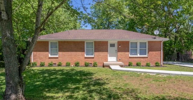 ranch-style house with a front yard