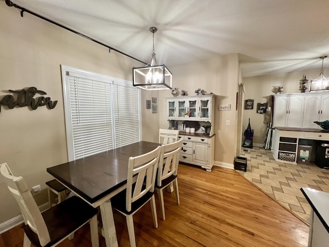 dining area with light wood-type flooring