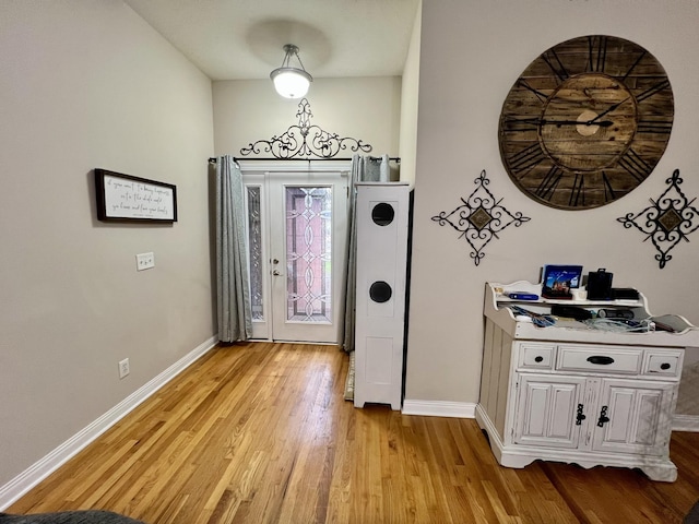 foyer with light hardwood / wood-style flooring