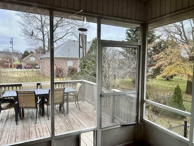 sunroom featuring a healthy amount of sunlight