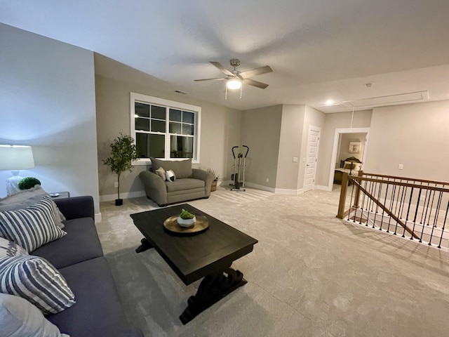 living room featuring light carpet and ceiling fan