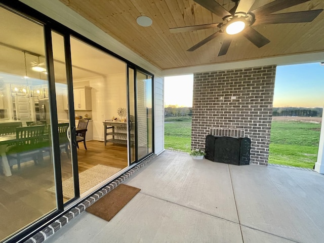 patio terrace at dusk with ceiling fan