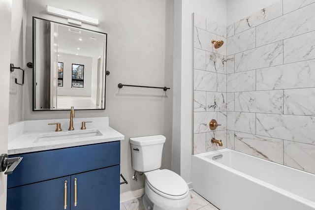 full bathroom with vanity, toilet, and tiled shower / bath