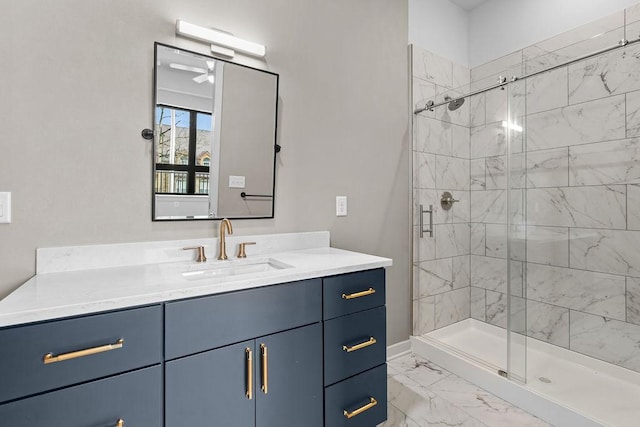 bathroom with vanity and a shower with door