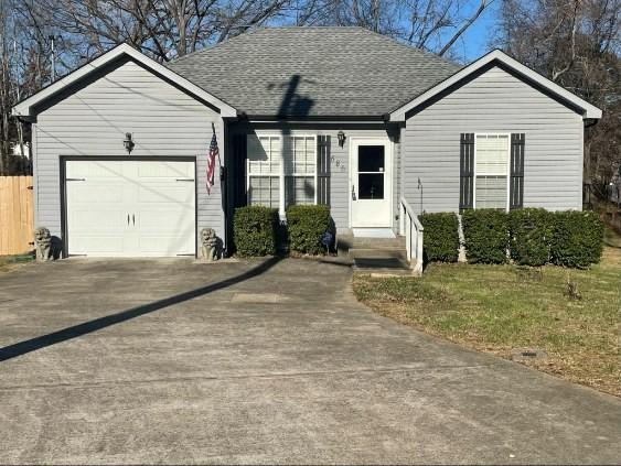 single story home with a garage