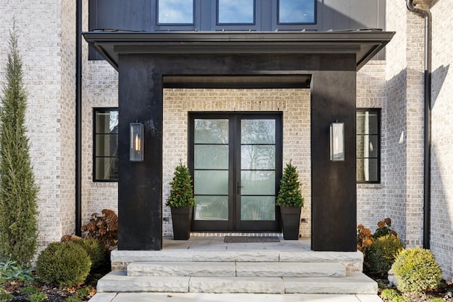 property entrance featuring french doors