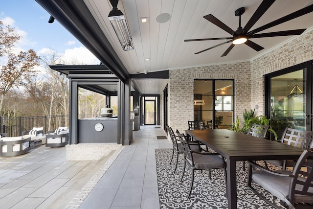 view of patio with ceiling fan