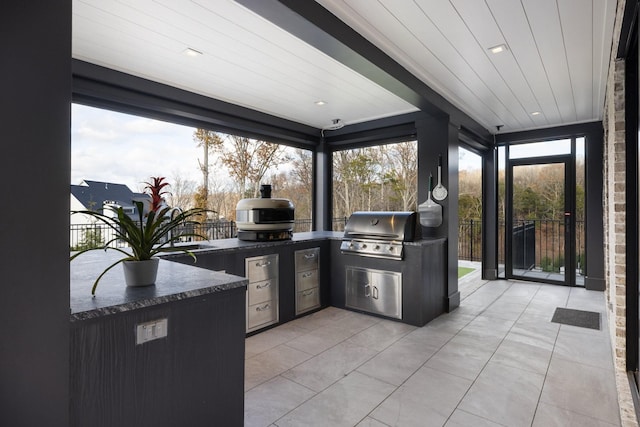 view of patio / terrace featuring area for grilling and exterior kitchen