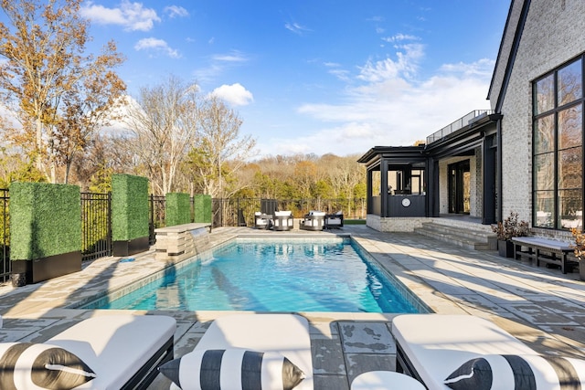 view of pool with a patio