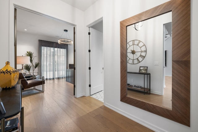 hallway featuring light hardwood / wood-style floors