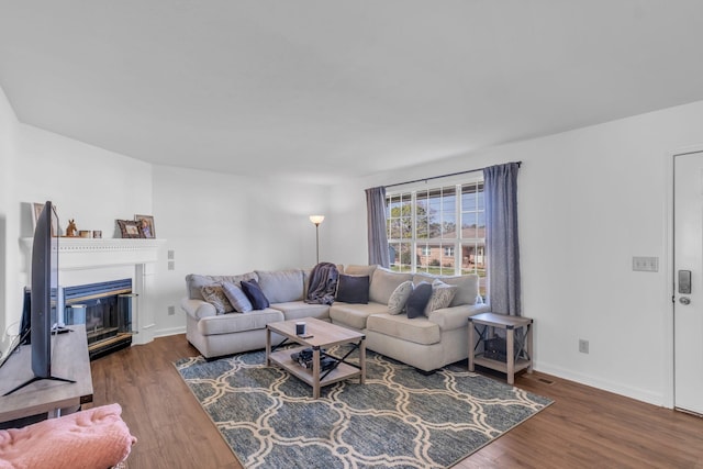 living room featuring dark hardwood / wood-style flooring