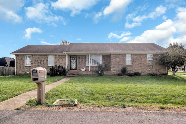 ranch-style house with a front lawn