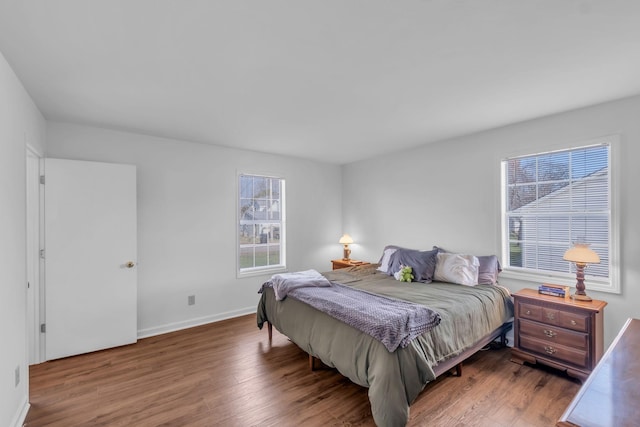 bedroom featuring dark hardwood / wood-style flooring