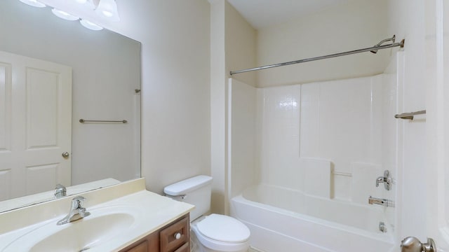 full bathroom with shower / washtub combination, vanity, and toilet