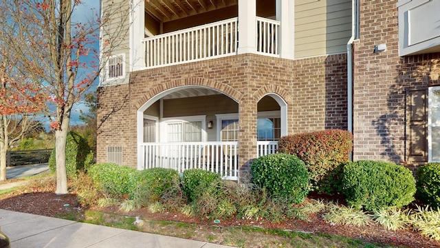 doorway to property with a balcony